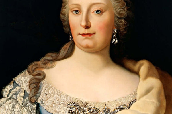 a portrait of a woman with curly blond hair wearing ornate blue and white dress and large diamond earrings