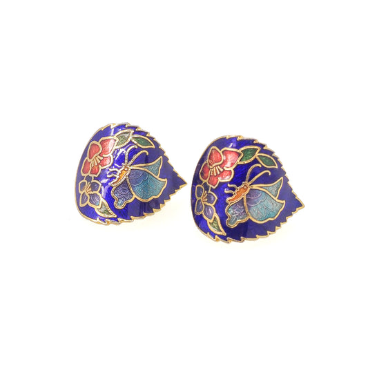 Pair of earrings with butterfly design on a white background