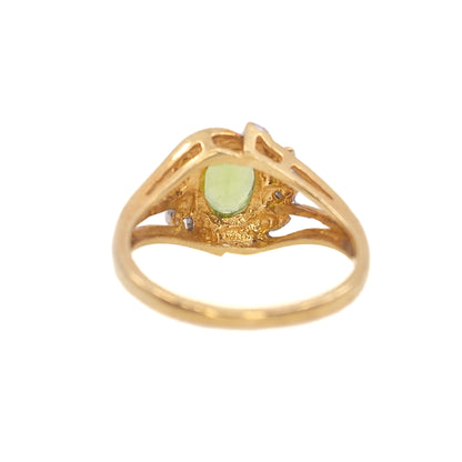 Vintage 1980s Oval Cut Green Peridot, Diamond, and 10k Gold Ring Size 7.25