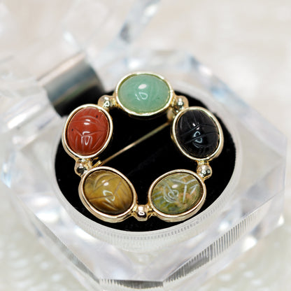 Vintage 1980s Egyptian Revival Carved Stone Scarab Wreath Brooch