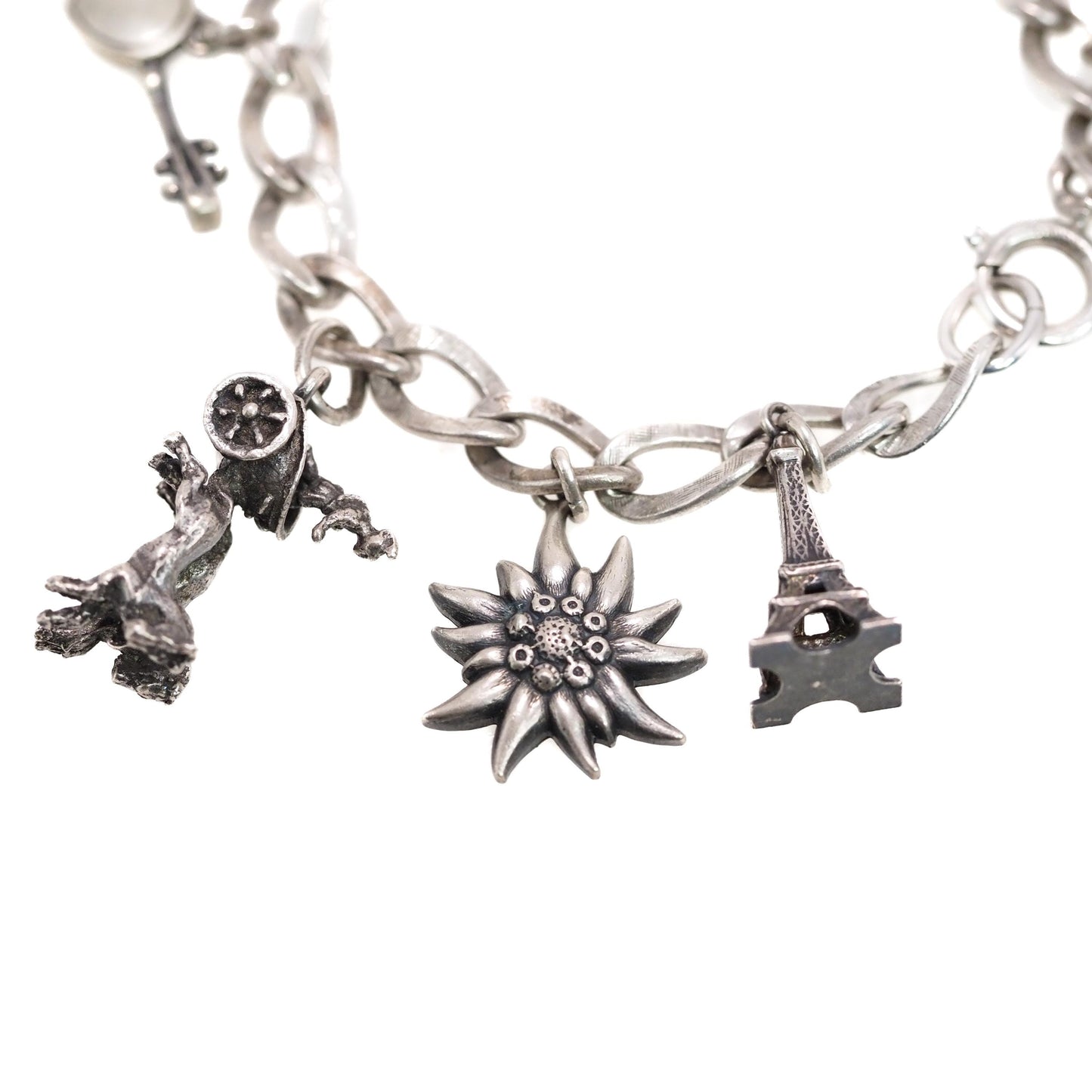 Vintage 1960s Sterling Silver Loaded Charm 7.25" Bracelet - 60s Charms Eiffel Tower, Viking Ship, Carriage, Leaf, Chariot, Flower, Windmill