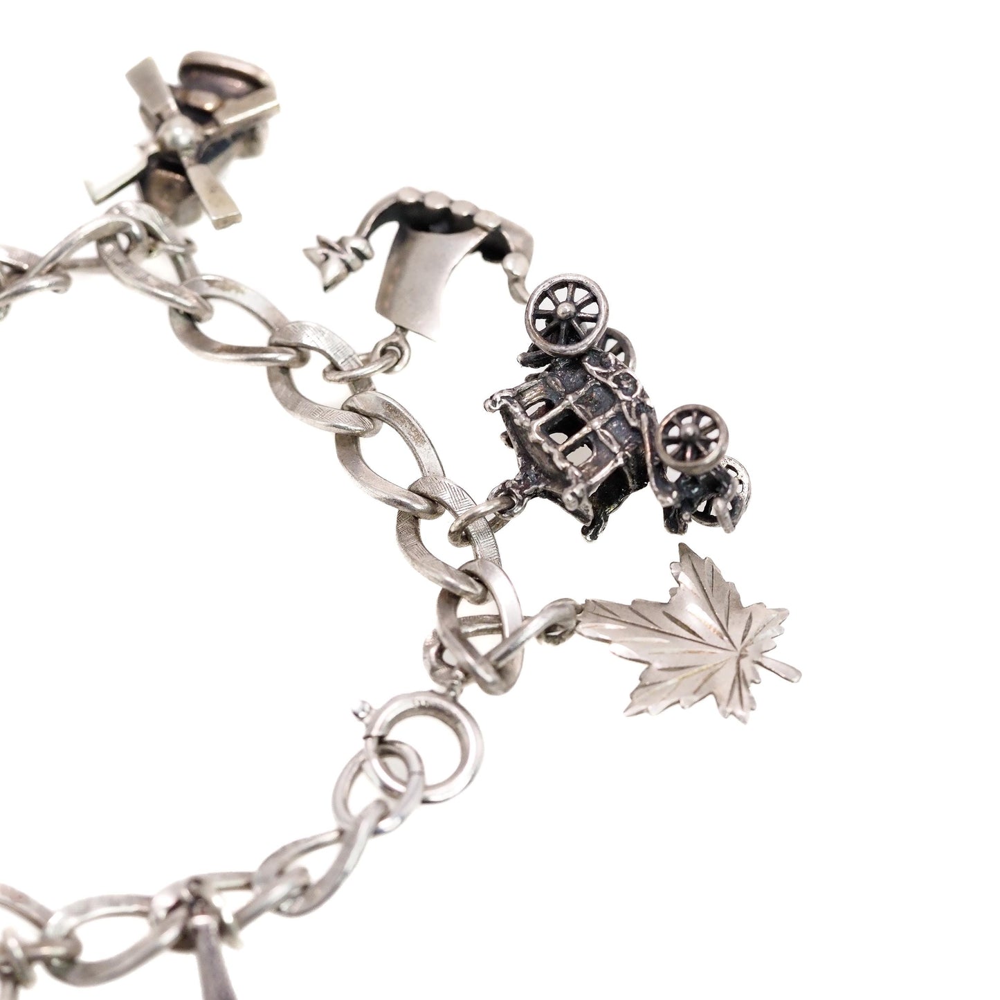 Vintage 1960s Sterling Silver Loaded Charm 7.25" Bracelet - 60s Charms Eiffel Tower, Viking Ship, Carriage, Leaf, Chariot, Flower, Windmill