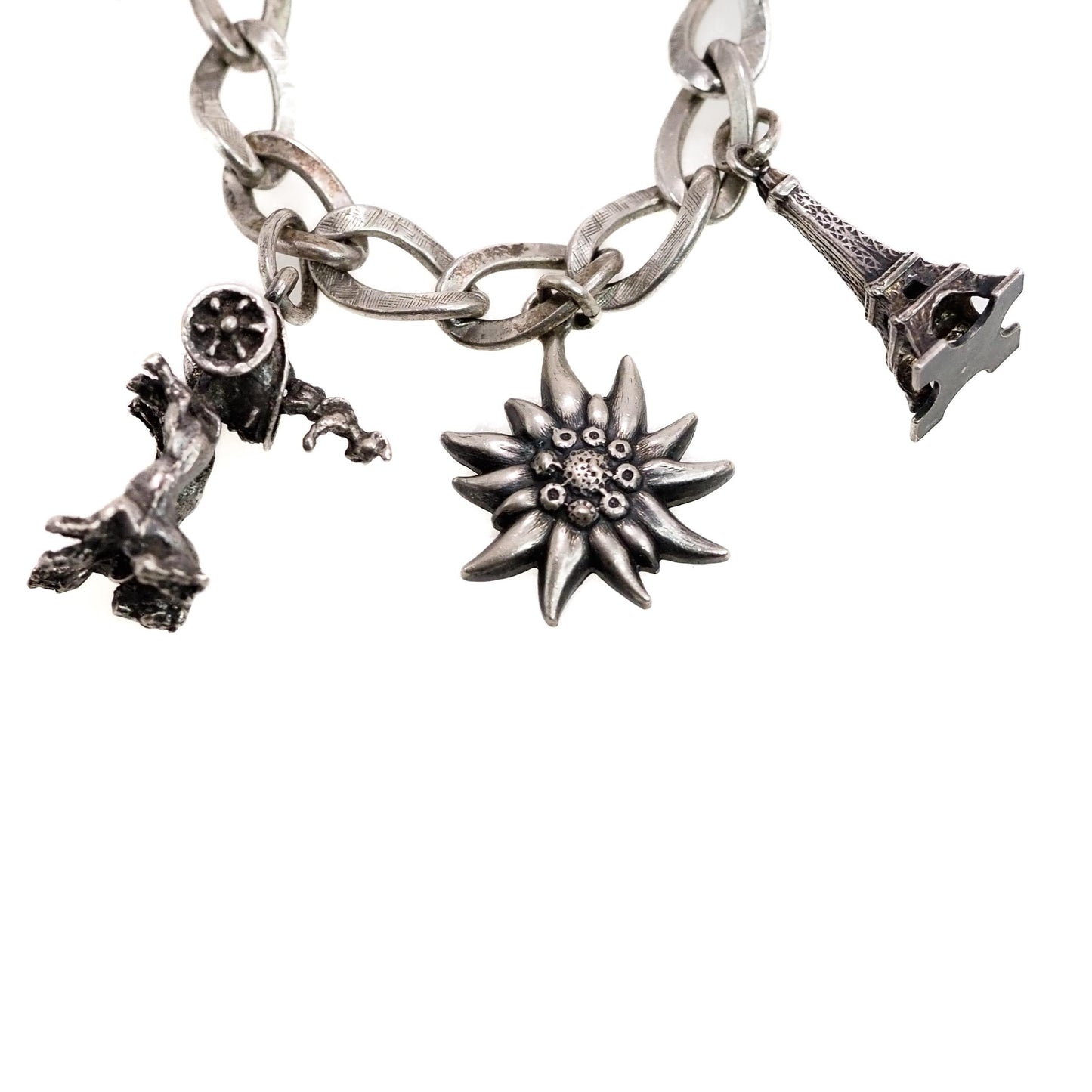 Vintage 1960s Sterling Silver Loaded Charm 7.25" Bracelet - 60s Charms Eiffel Tower, Viking Ship, Carriage, Leaf, Chariot, Flower, Windmill